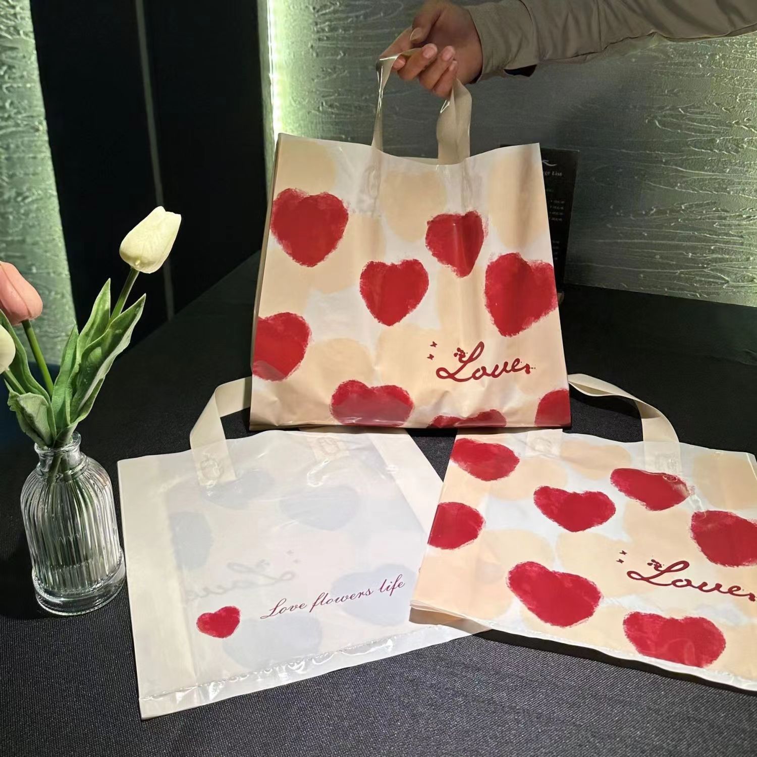 Clear PE plastic shopping bag with stylish printed pattern and handles
